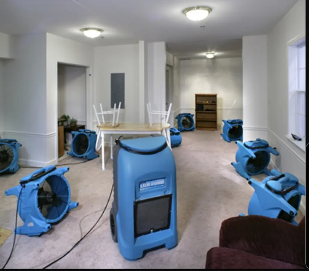 Air movers and dehumidifier setup for Water Damage Restoration in South Fayette